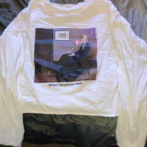 Selling a long sleeve crop top Color white, light purple, and black size medium.